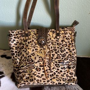 Myra leopard hair on hide leather